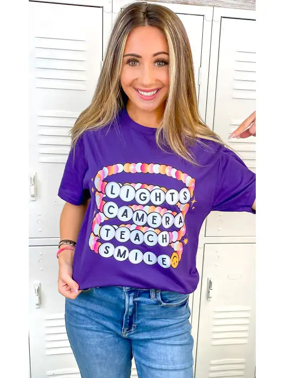 Lights Camera Teach Smile Purple Graphic T-Shirt